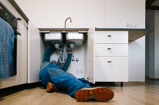 Professional Drain Cleaning technician working in New Town, ND